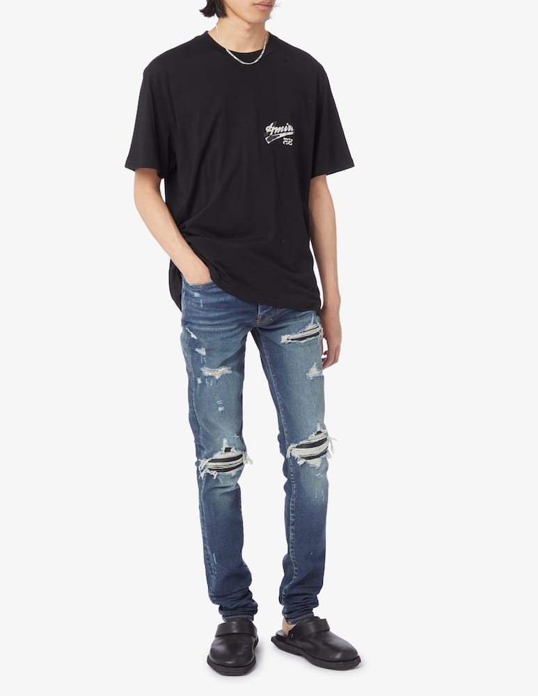Shop Amiri Bandana mx1 jeans on Rinascente