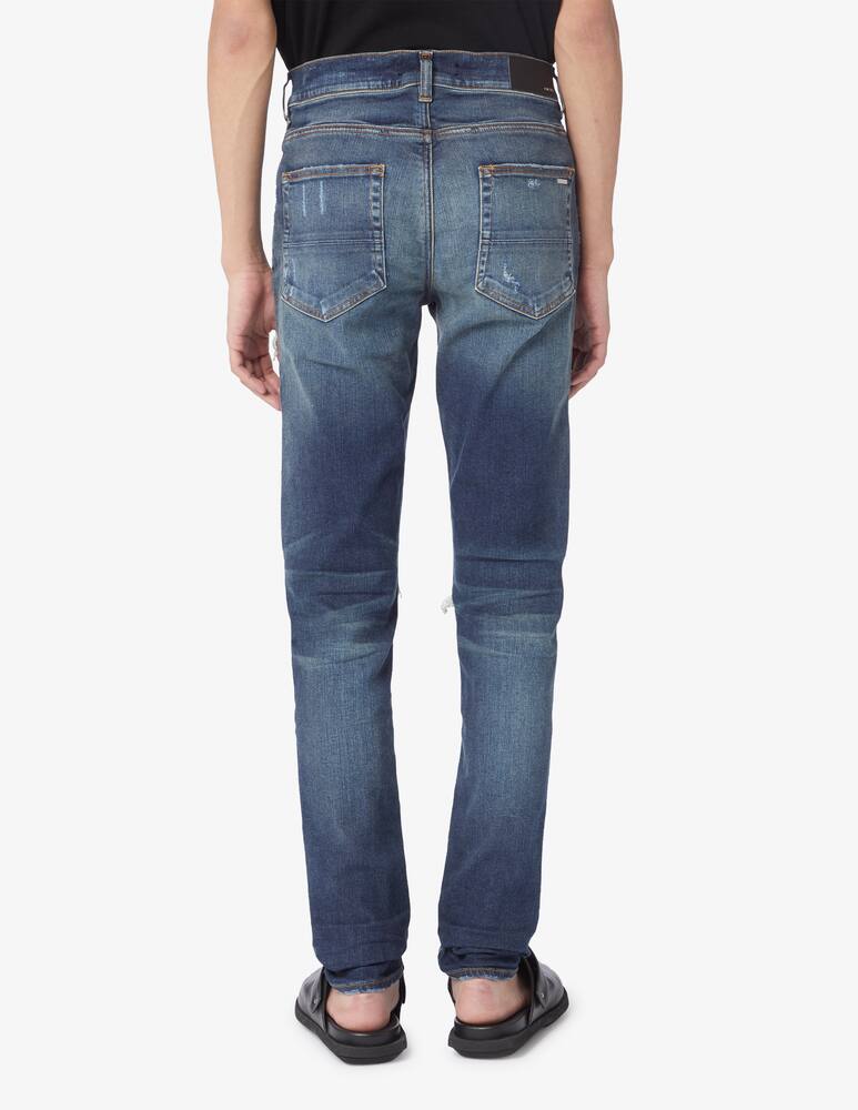 Shop Amiri Bandana mx1 jeans on Rinascente