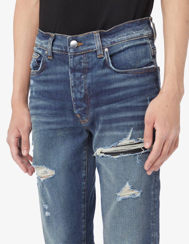 Shop Amiri Bandana mx1 jeans on Rinascente