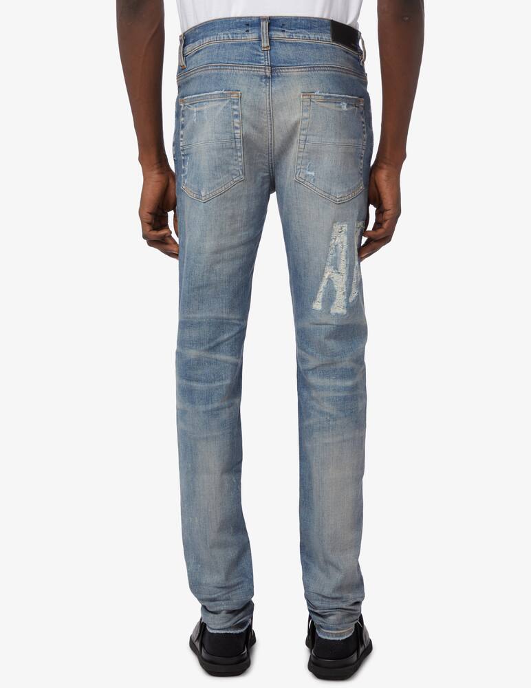 rinascente Amiri Serif logo jeans 