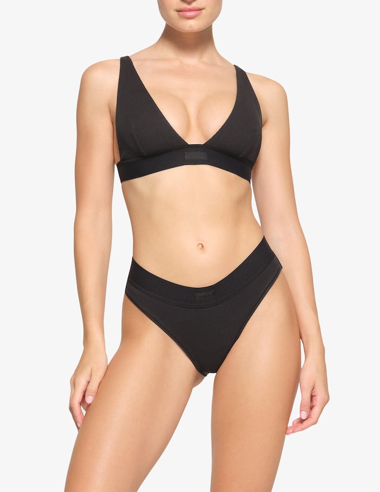 SKIMS Bralette con scollo profondo - immagine 2 SKIMS Bralette con scollo profondo - immagine 2