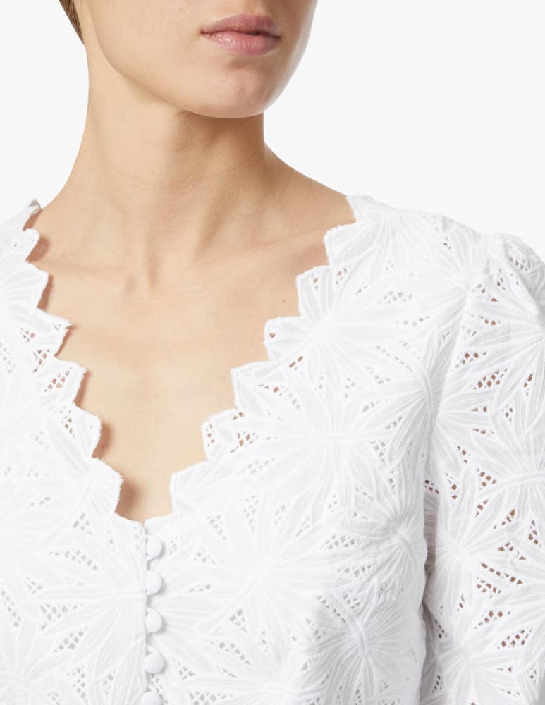 rinascente Michael Michael Kors Top crop a manica lunga e scollo a V - bianco