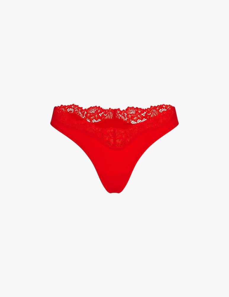SKIMS Lace trim thong - picture 1