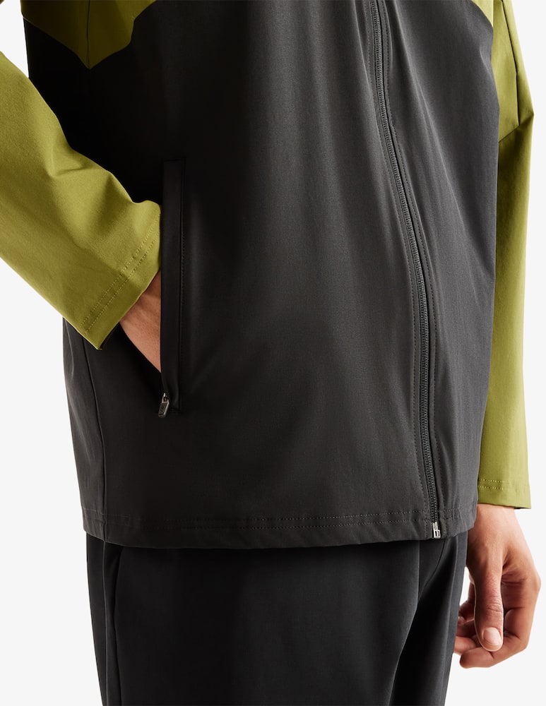 New Balance Giacca stretch utility con cappuccio - immagine 4 New Balance Giacca stretch utility con cappuccio - immagine 4