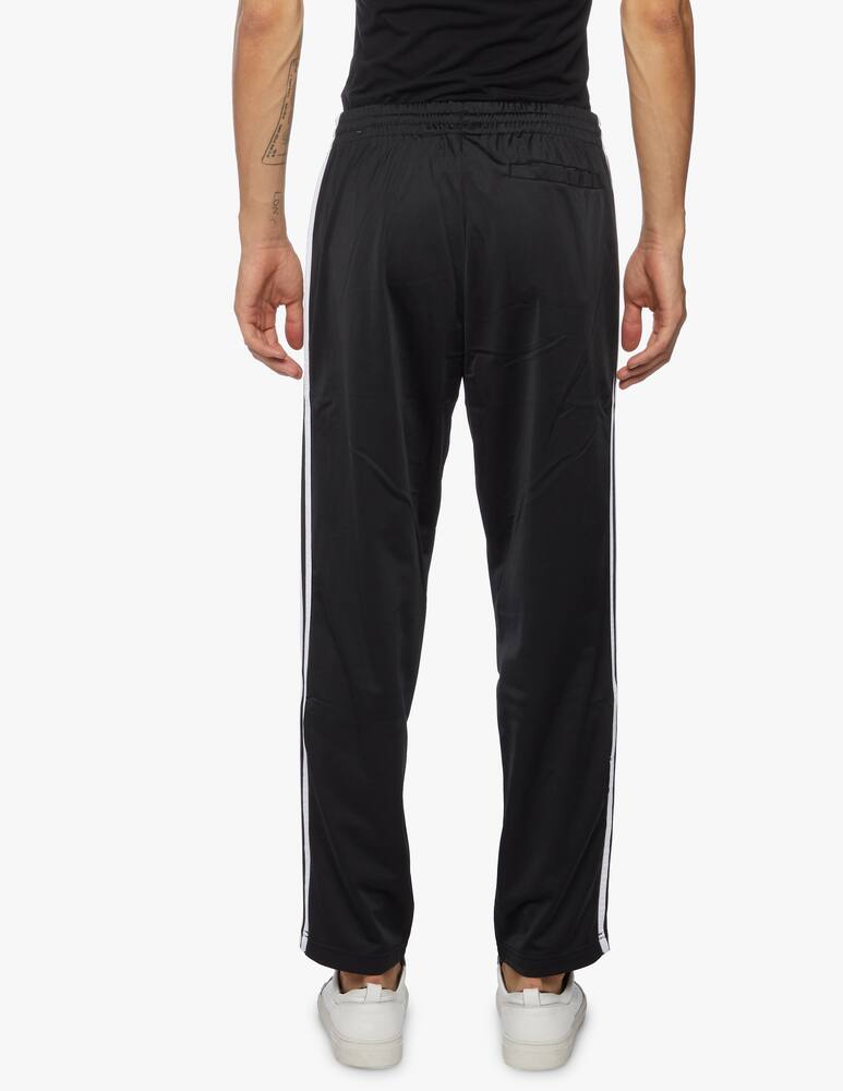rinascente Adidas Originals Firebird track pants - black