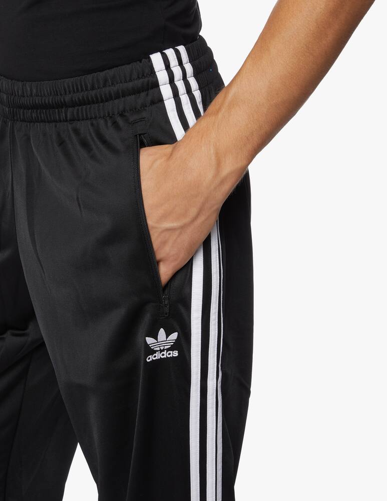 rinascente Adidas Originals Firebird track pants - black