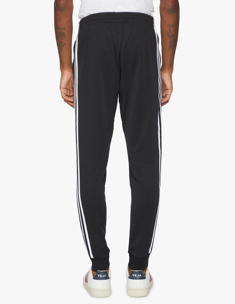 rinascente Adidas Originals Adicolor classics primeblue sst track pants - black