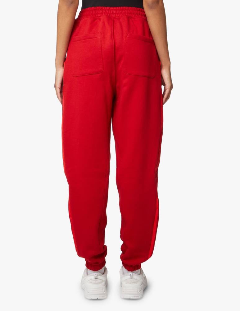 rinascente Adidas Originals Pantaloni di tuta in cotone Ivy Park - rosso