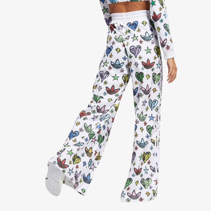 rinascente Adidas Originals Jeremy Scott Monogram  trousers - White
