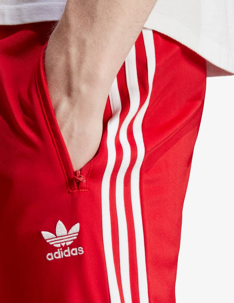 rinascente Adidas Originals Acetate firebird straight trousers