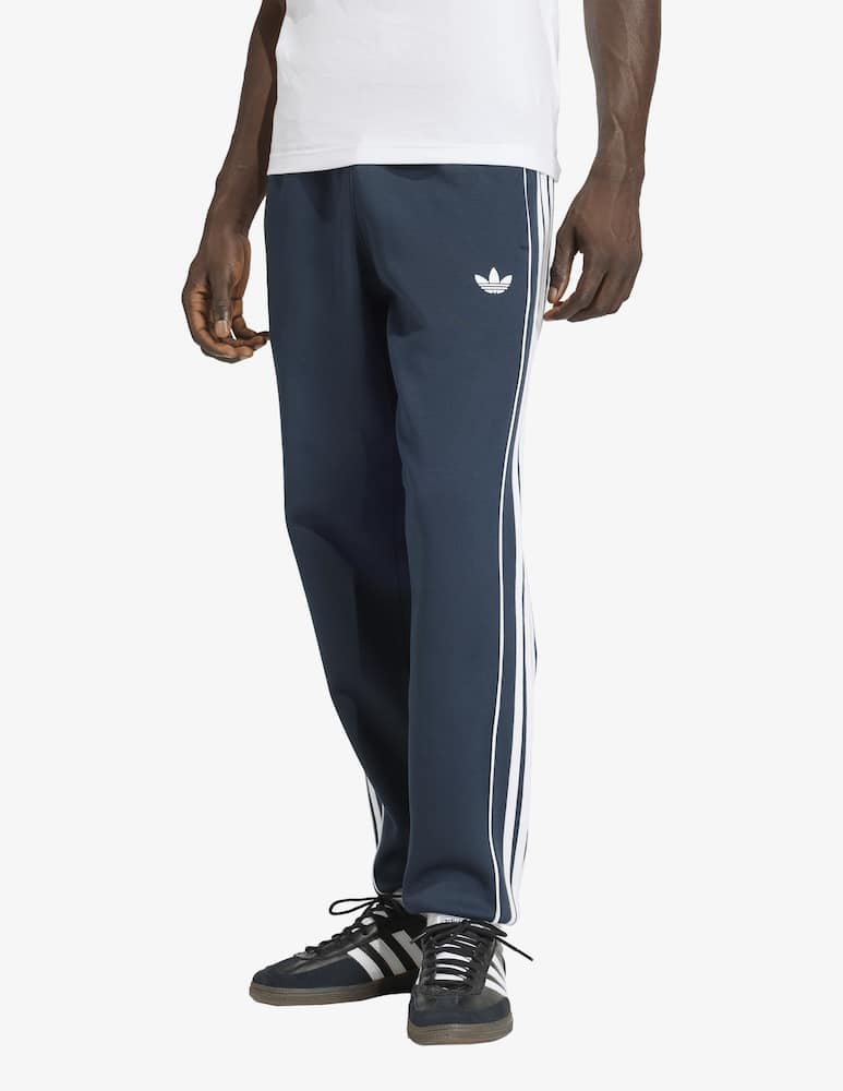 rinascente Adidas Originals Striped track trousers