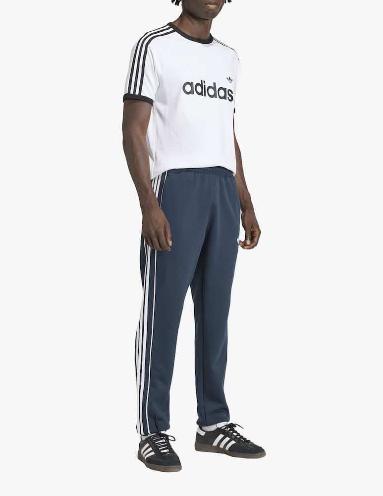 rinascente Adidas Originals Striped track trousers