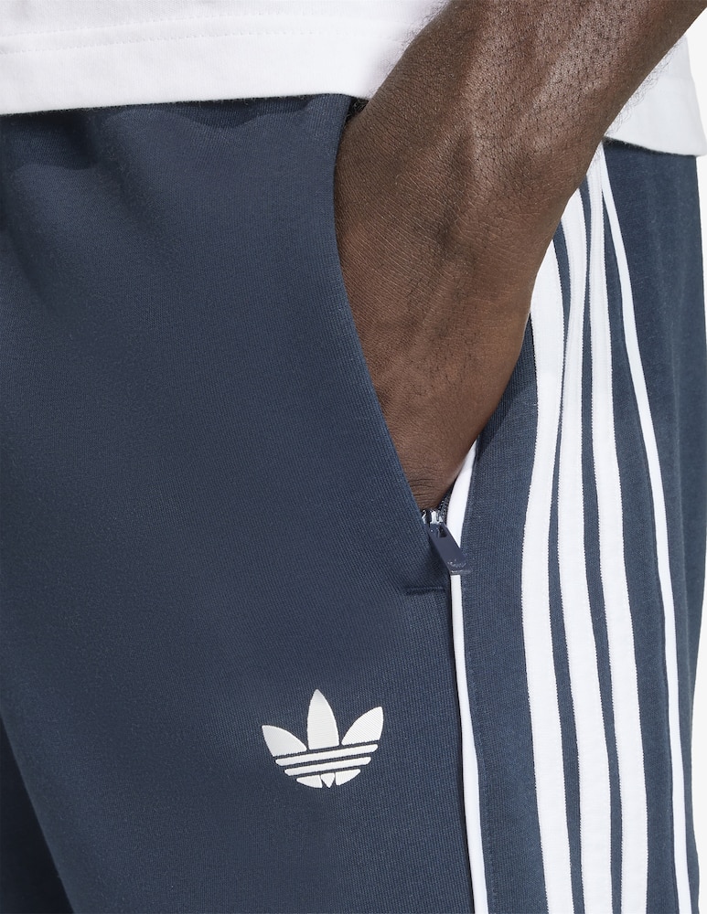rinascente Adidas Originals Striped track trousers