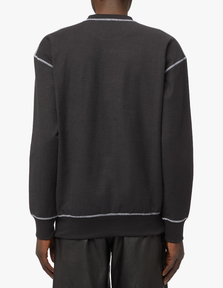 rinascente JW Anderson Maglia in cotone inside out logo - nero