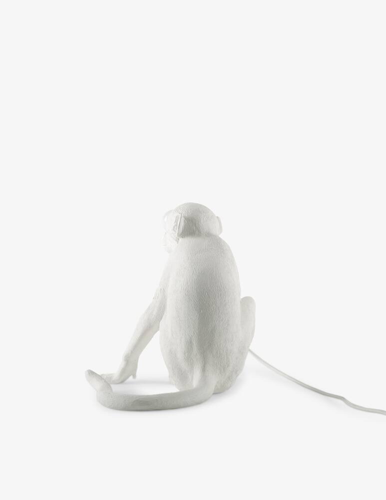 rinascente Seletti The Monkey Lamp seduta - bianco