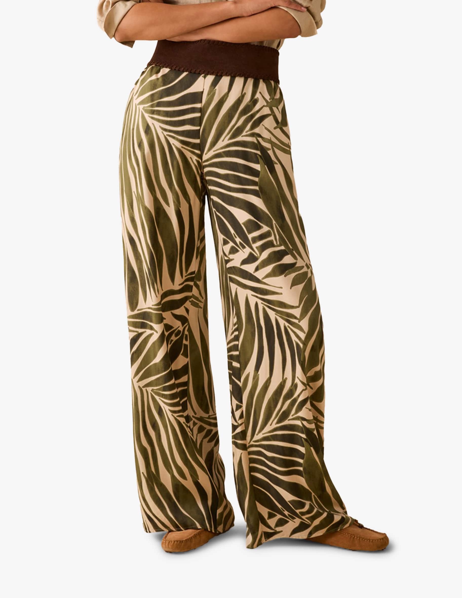 Shop PENNYBLACK Palm print trousers on Rinascente