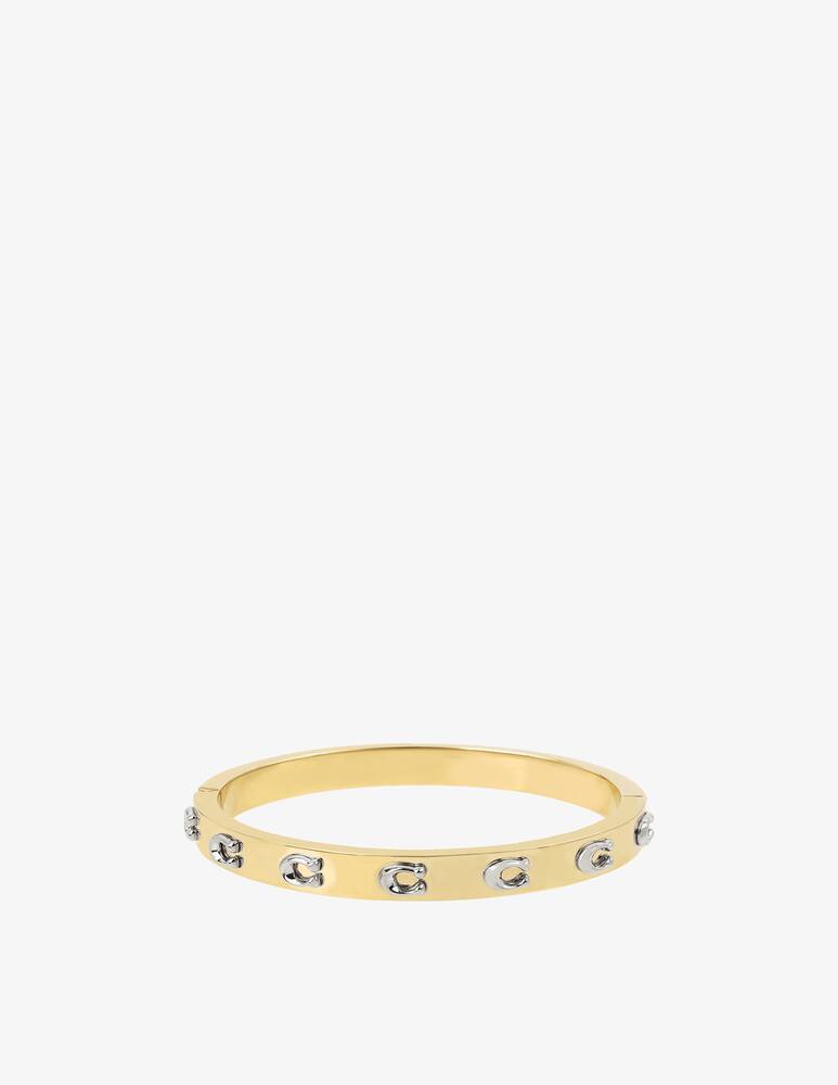 COACH Bracciale rigido con cerniera Signature C - immagine 1 COACH Bracciale rigido con cerniera Signature C - immagine 1