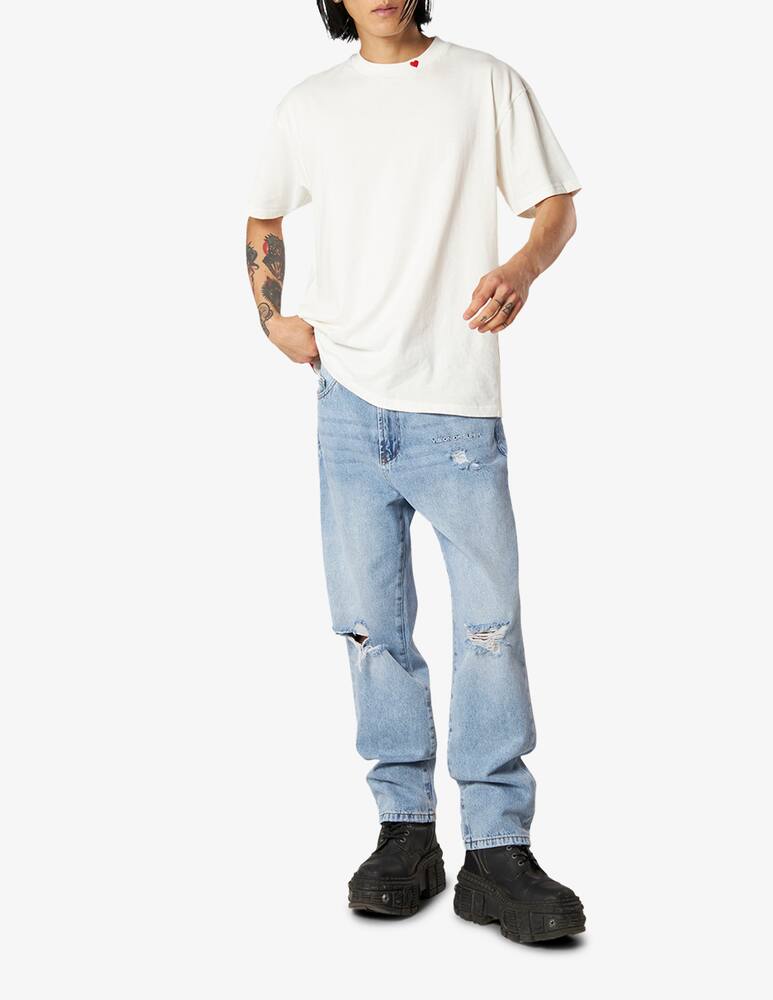 rinascente Vision of Super Jeans strappati con logo