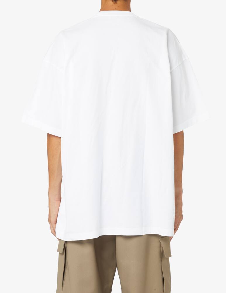 rinascente Off-White Blurr book over t-shirt