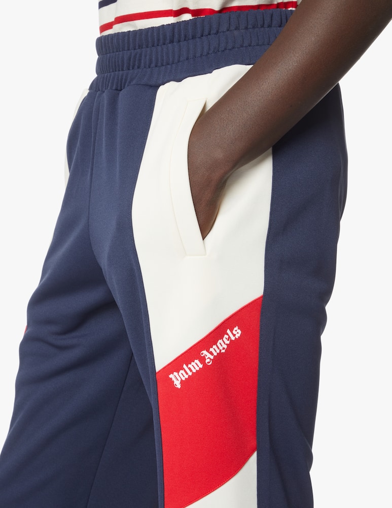 rinascente Palm Angels V color block track pants - blue