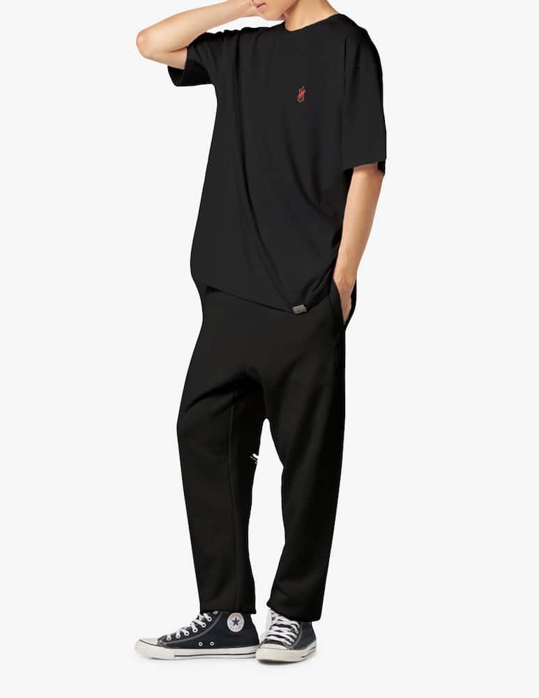 rinascente Vision of Super Pants with flames logo and metal label