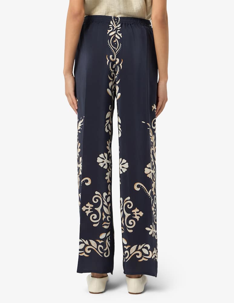 rinascente 19.70 Seventy Ornate print viscose trousers