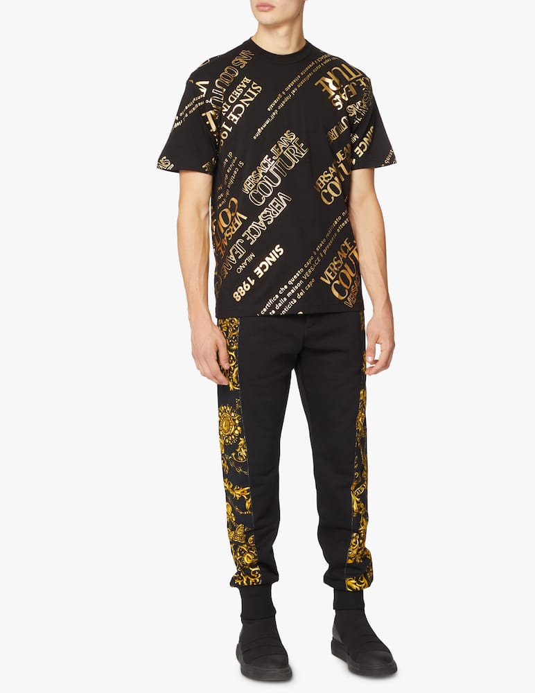 rinascente Versace Jeans Couture Pantaloni tuta barocco lateral