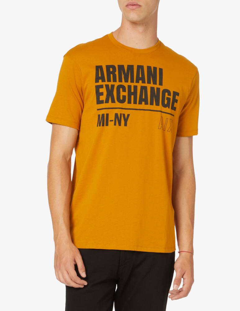 Armani Exchange Maglietta in cotone con scritta - Arancione - immagine 1 Armani Exchange Maglietta in cotone con scritta - Arancione - immagine 1