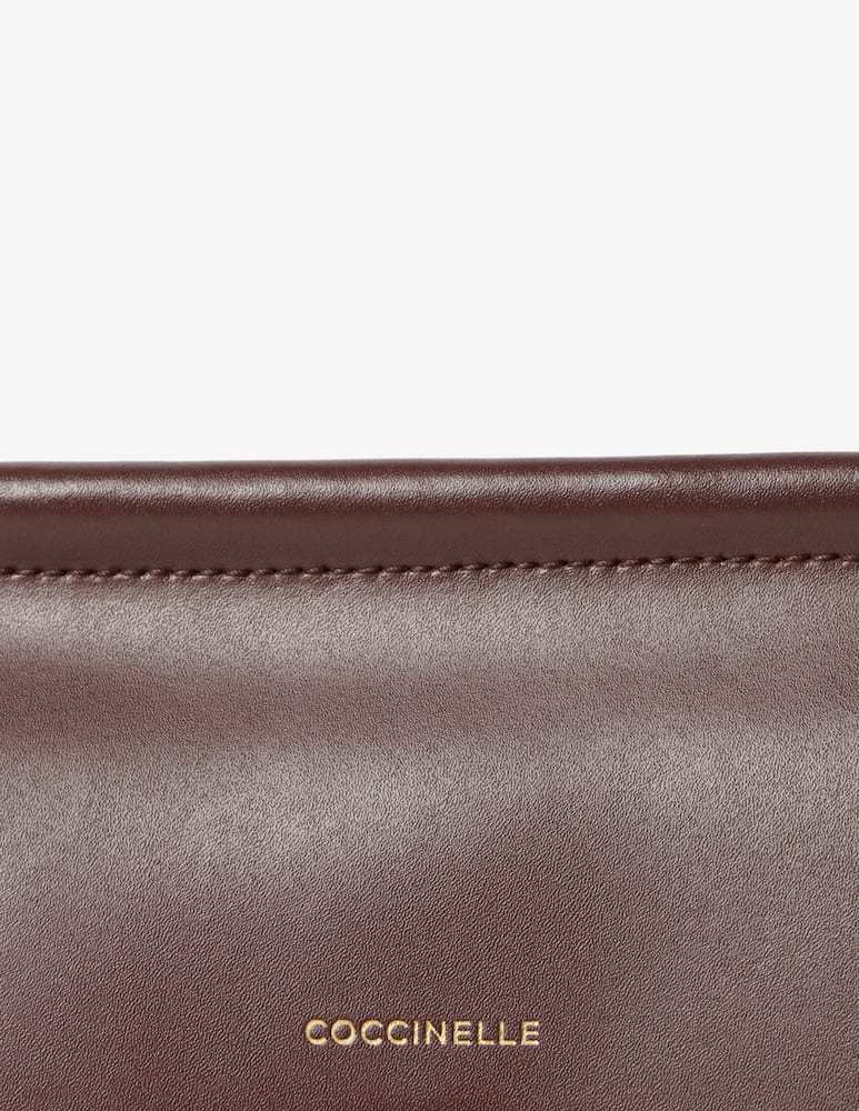 rinascente Coccinelle Cora top handle clutch