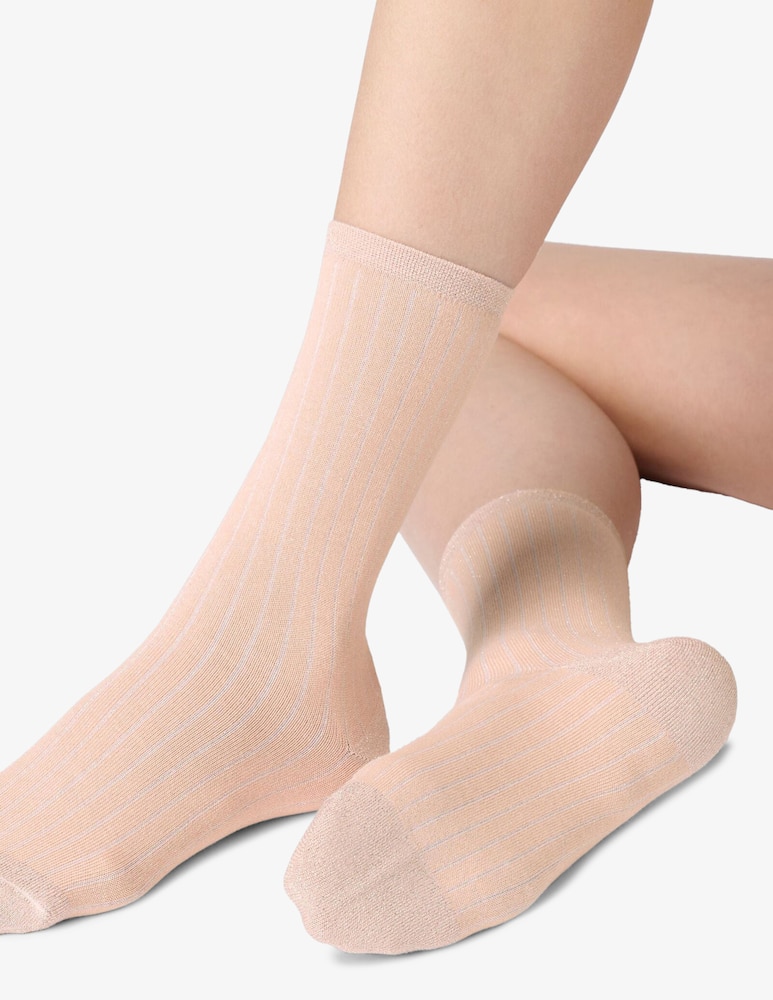 rinascente Oroblu Calzini glowing line a coste