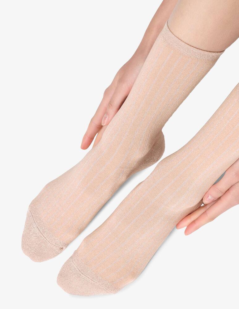 rinascente Oroblu Calzini glowing line a coste